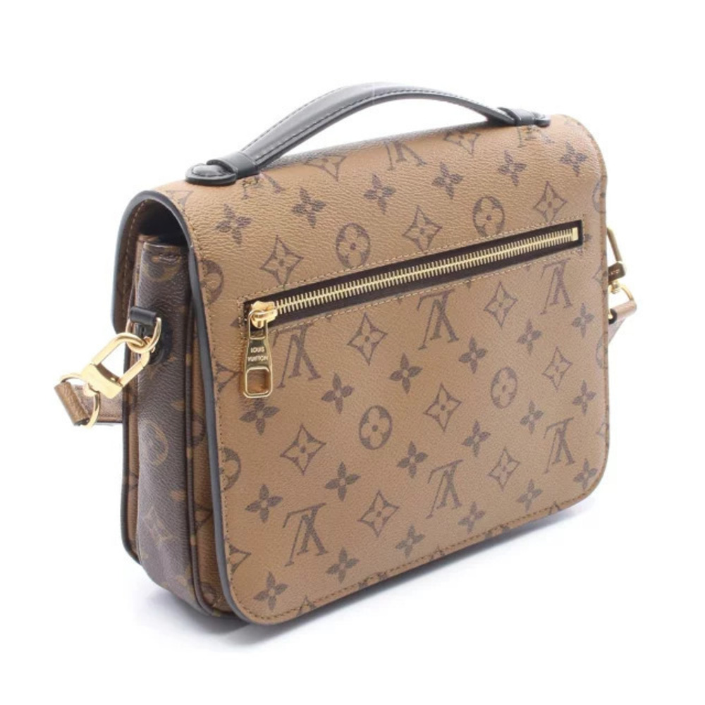 Louis Vuitton Leather Brown Handbag Canvas Metis Reverse Monogram Pochette